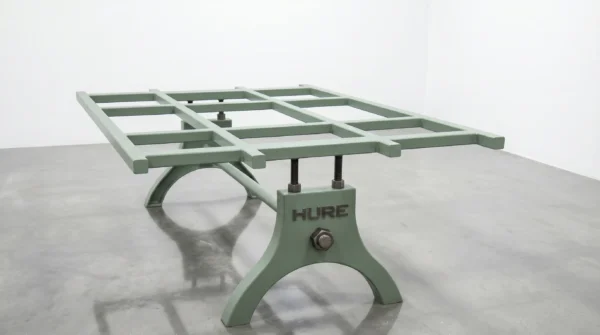 Hure table base with sage green paint finish — period-correct factory-floor color