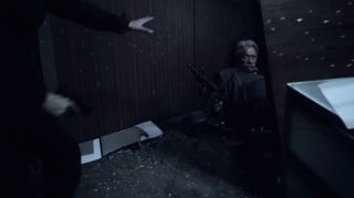 Shield Olmos with gun