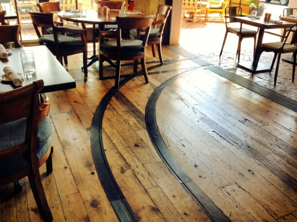Train table in floor tracks at Four Seasons Restaurant Proof Canteen.