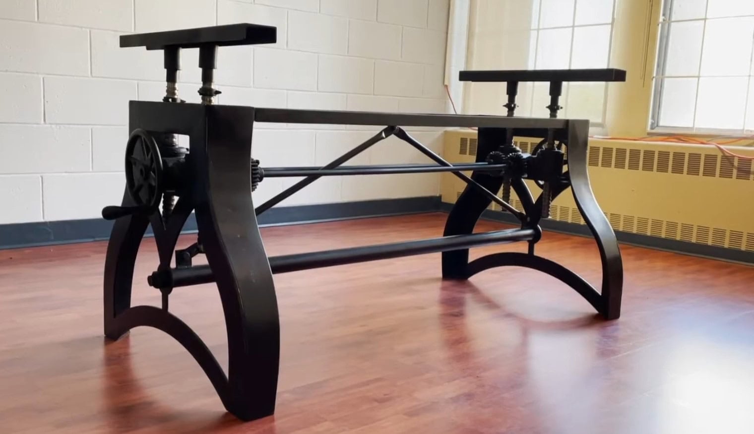 Indian-manufactured copy of the Vintage Industrial IndustriaLux adjustable height crank table — full base view